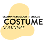 Et badge, der viser en nominering til Costume Skjønnhetsfavoritter 2022 på en stiliseret grafisk baggrund.