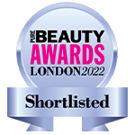Et mærke, der viser en nominering til Pure Beauty Awards London 2022.