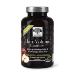 New Nordic Hair Volume™-gummibonbons med æble, urter og biotin. Biotin og zink bidrager til at opretholde normalt hår.
