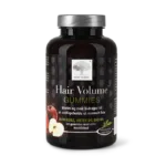 New Nordic Hair Volume™-gummibonbons med æble, urter og biotin. Biotin og zink bidrager til at opretholde normalt hår.