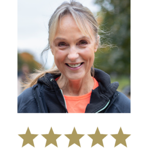 Magic Magnesium™ Malate 7 En smilende kvinde med fem stjerner under billedet.