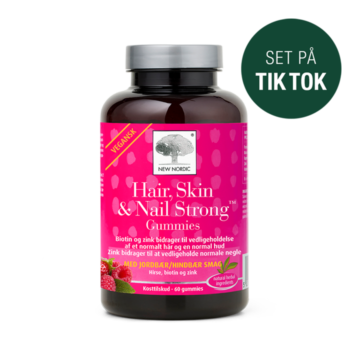 New Nordic Hair, Skin & Nail Strong™-gummibonbons med jordbær- og hindbærsmag, hvor biotin og zink bidrager til at opretholde normalt hår, hud og negle, mærket med et »Set på TikTok«-mærke.